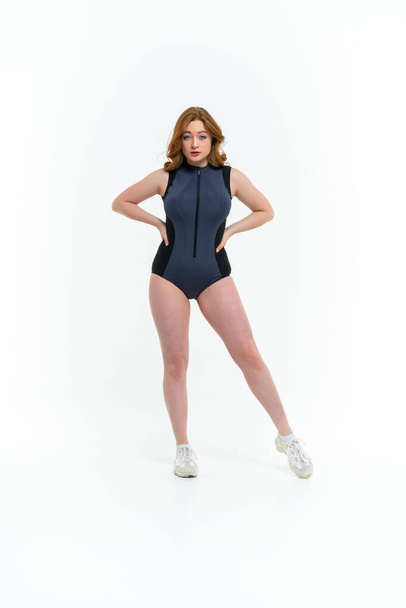 model size posing bodysuit on white background - Foto, Imagem