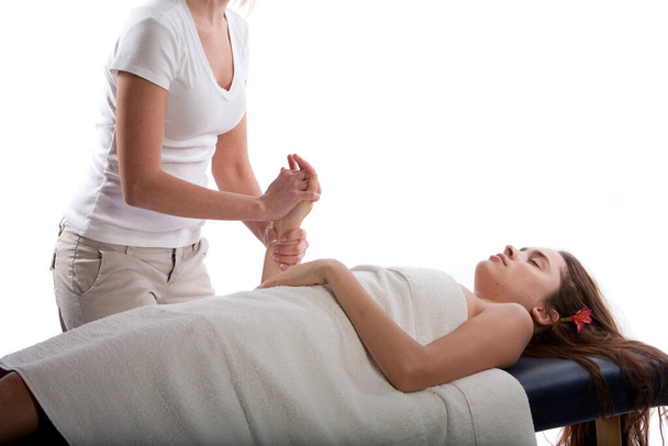Massage therapist massaging woman's hand - Fotoğraf, Görsel