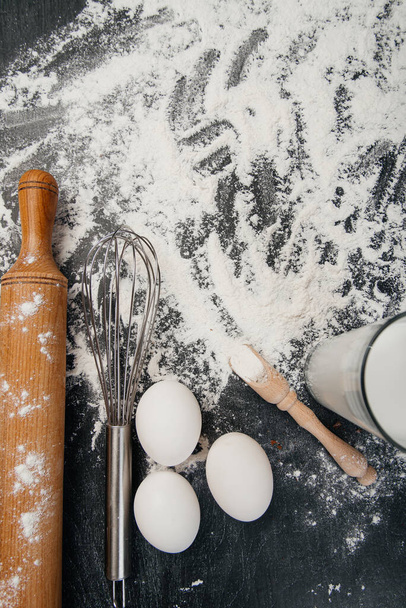 Bakery products -flour, eggs, milk. Selective focus copy space - Photo, image