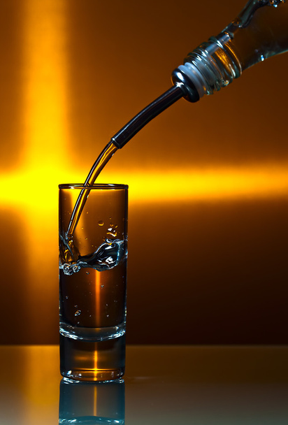 vodka  on  glass table - Foto, imagen