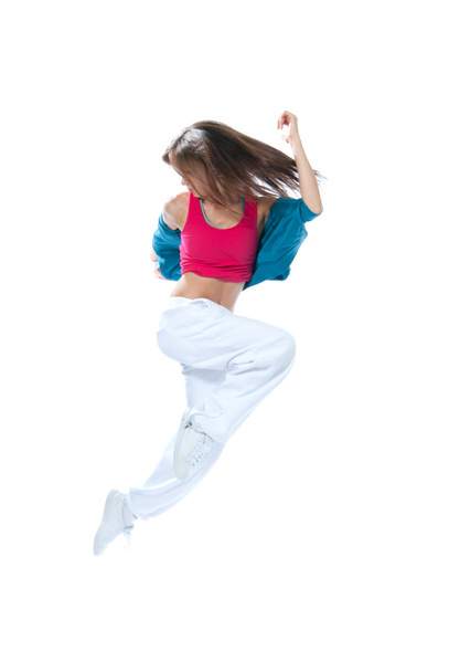 New pretty modern slim hip-hop style woman dancer jumping dancin - 写真・画像