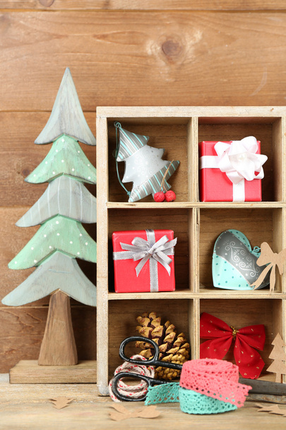 Christmas gifts in wooden crate - Foto, Imagen