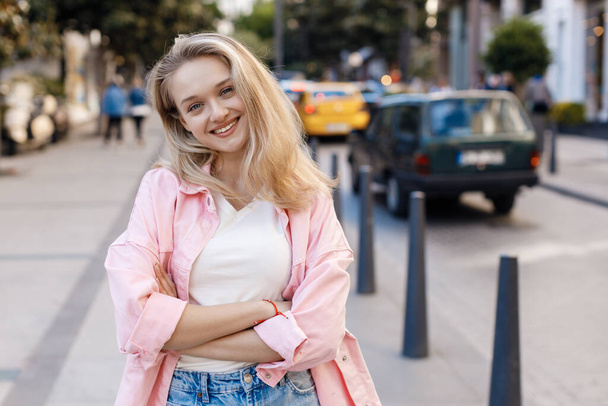 young pretty blond woman outdoor. High quality photo - 写真・画像