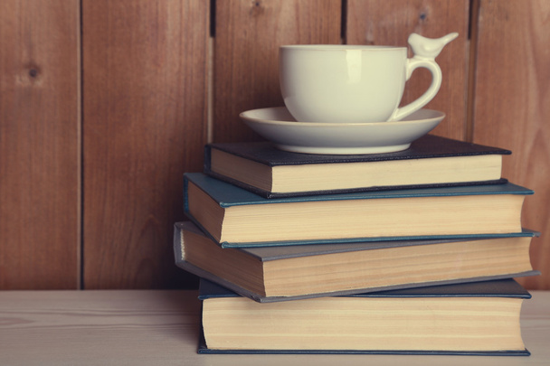 Pile of books with cup - Foto, Imagem
