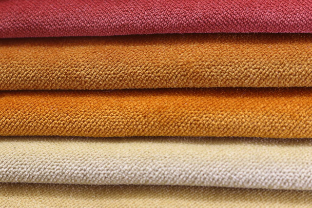 Collection of colorful upholstery fabric samples. Close up. Multicolor fabric texture background. - Φωτογραφία, εικόνα