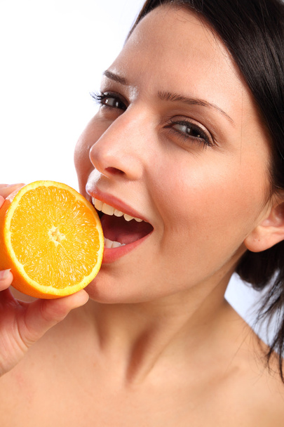 Vitamin C orange fruit for beautiful young woman - Foto, immagini