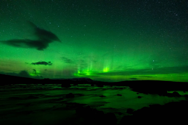 Northern lights over the river - Photo, Image