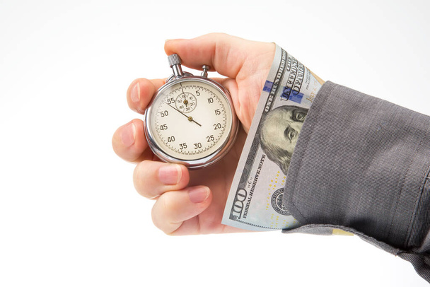 mechanical stopwatch and dollars in man hand. Part time accuracy for business. business and finance time. - Photo, image