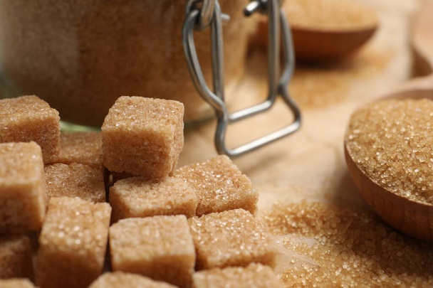 Refined brown sugar cubes on table, closeup - Foto, immagini