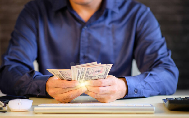 man holding money, online banking concept - Фото, зображення
