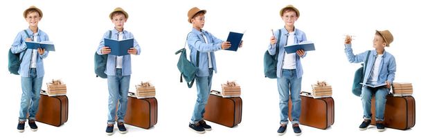 Conjunto de pequeño aventurero lindo con libro y equipaje sobre fondo blanco - Foto, imagen