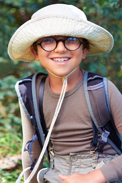 Ready for an adventure. Portrait of a cute little boy scout outdoors smiling - Photo, Image