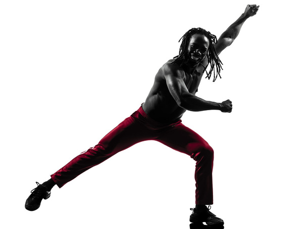 african man exercising fitness zumba dancing silhouette - Фото, изображение