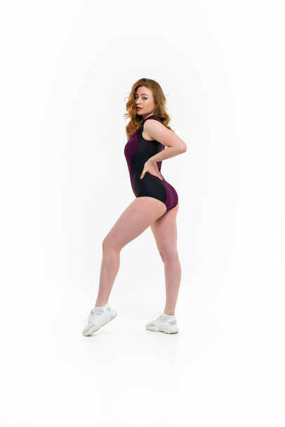 model size posing bodysuit on white background - Фото, изображение