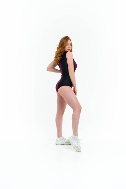 model size posing bodysuit on white background - 写真・画像