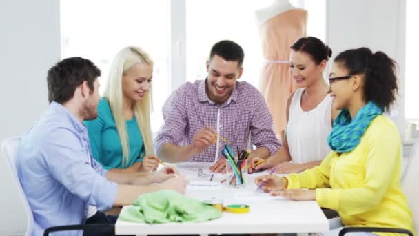 smiling fashion designers working in office - Footage, Video