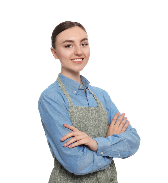 Beautiful young woman in clean apron on white background - Фото, изображение