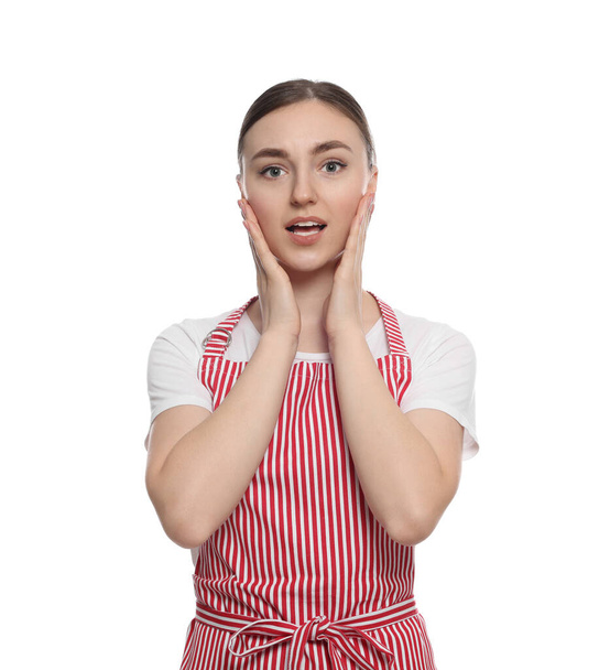 Beautiful young woman in clean striped apron on white background - Foto, Imagem