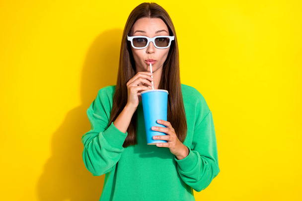 Portrait of nice young lady hands hold sipping drink cup straw isolated on yellow color background. - Fotoğraf, Görsel