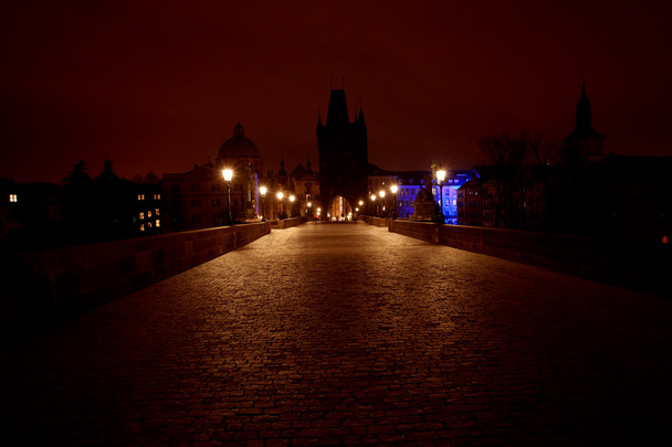 A beautiful night view of the Charles Bridge in Prague - Photo, image