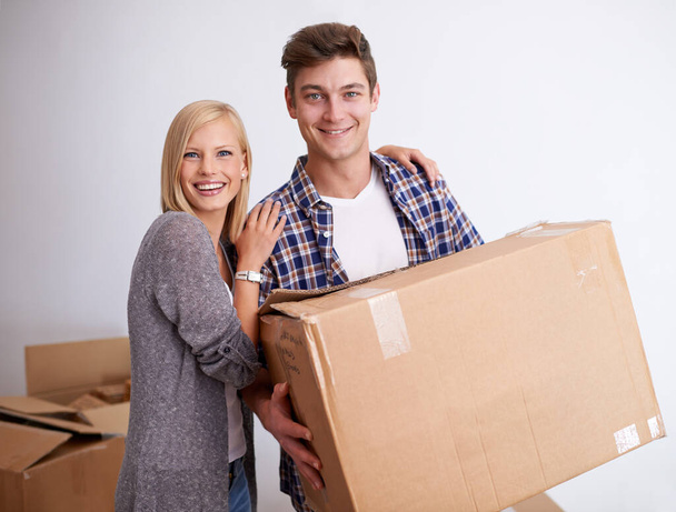 So glad we decided to move. a happy young couple on their moving in day - Photo, Image