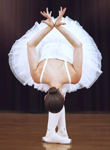 Ballet, training and art performance with ballerina express freedom with classic, elegant move in a dance studio. Free woman practice a routine, flexible with high energy and perfect dancing posture. - Valokuva, kuva
