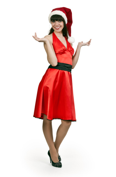 Girl in a red dress, hat santa - Foto, imagen