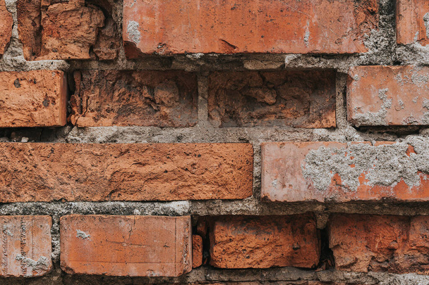 Old brick wall. Red bricks in a row background. Grunge texture - 写真・画像