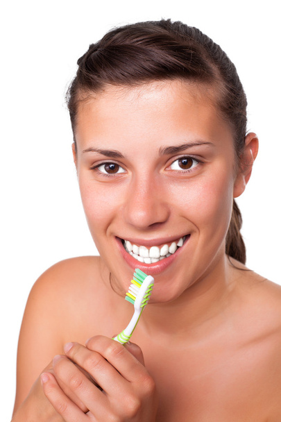 Girl Brushing her Teeth - Фото, изображение