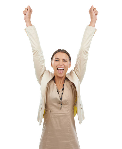 Another business victory. Studio shot of a young businesswoman celebrating her success isolated on white - Foto, Imagen