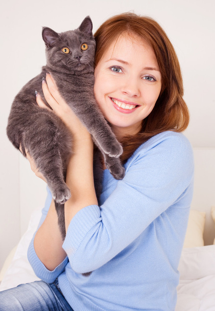 Girl with a cat - Fotó, kép