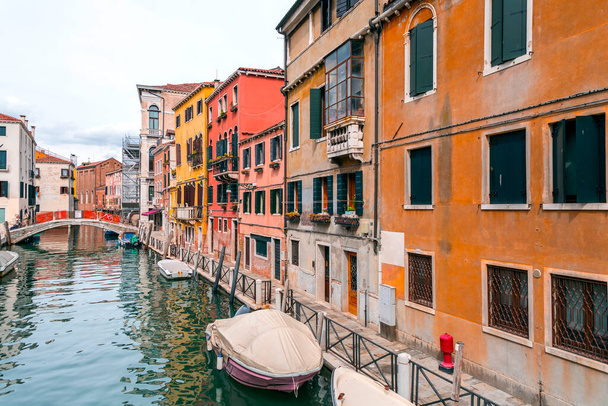 Venice, Italy - April 2, 2022: Beautiful canals and traditional Venetian buildings in Venice, Veneto, Northeast Italy. - Zdjęcie, obraz