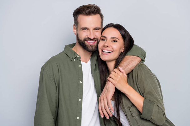 Portrait of attractive tender sweet cheerful couple cuddling romance time enjoying isolated over grey pastel color background. - Photo, image