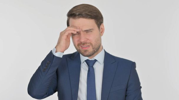Young Adult Businessman with Headache on White Background - Foto, afbeelding