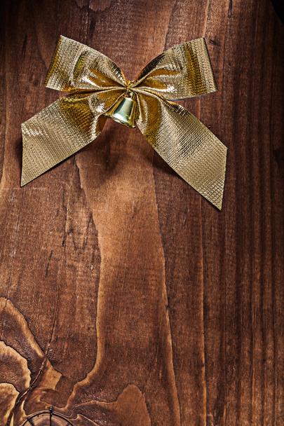 Single golden christmas bow - Foto, imagen