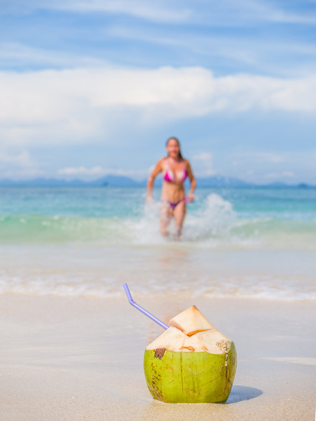 Woman on the beach with coconut drink  - Zdjęcie, obraz