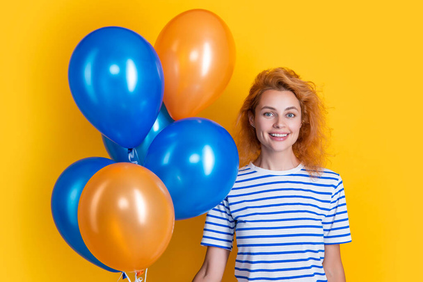 happy woman hold party balloons in studio. woman with balloon for party isolated on yellow background. party woman with balloon. - Fotoğraf, Görsel