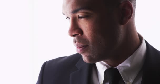 Profile of handsome black man wearing a suit - Footage, Video