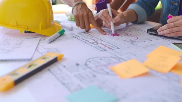 Builder blueprint, engineering and architecture of a team development project in a office. Business construction, collaboration and teamwork workforce of engineer building staff group working. - Footage, Video