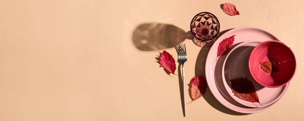 Autumn table setting on beige background with space for text - Foto, imagen