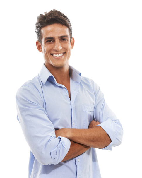 Hes got it all figured out. Portrait of a handsome young man standing with his arms crossed isolated on white - Foto, Imagen