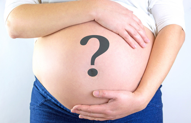 Zwangere buik met vraagteken - Foto, afbeelding