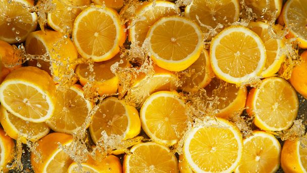 Freeze Motion Shot of Splashing Fresh Lemons, Close-up. - Fotografie, Obrázek
