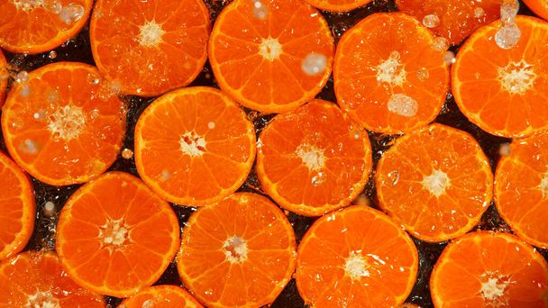 Freeze Motion Shot of Splashing Fresh Tangerines, Close-up. - Fotografie, Obrázek