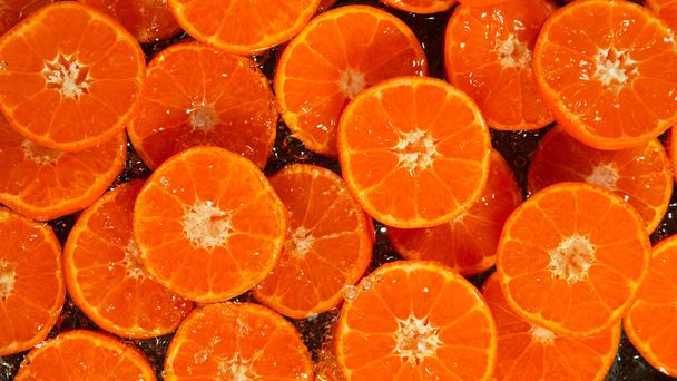 Freeze Motion Shot of Splashing Fresh Tangerines, Close-up. - Fotografie, Obrázek