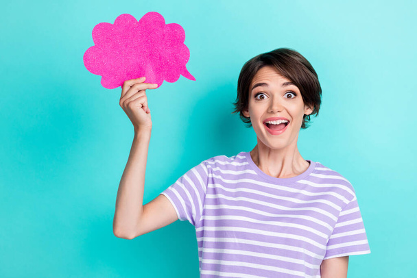 Photo of gorgeous impressed nice woman with bob hairdo dressed striped t-shirt hold pink cloud isolated on turquoise color background. - Zdjęcie, obraz