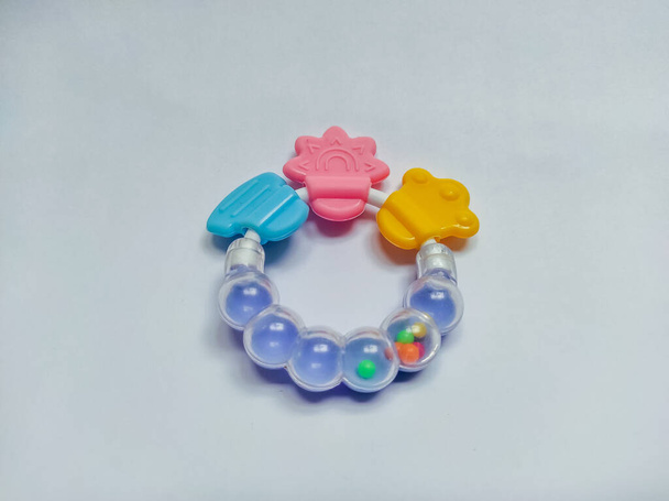 Newborn plastic chewing toy. Plastic colorful keys for small babies. Teething Toys. Baby Teether Silicone Chewing Toys for Newborn Toddler. - Фото, изображение
