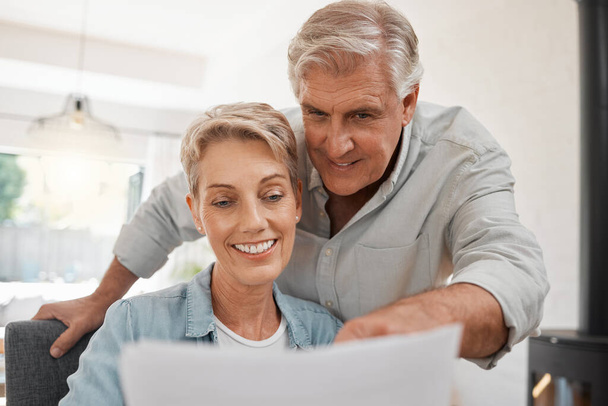 Retirement couple budget, finance and investment planning, loan and paperwork bills at home. Happy man, senior woman and people reading admin notes, cash savings and financial pension report letter. - Photo, Image