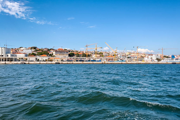 View from a tour ferryboat over the city of Lisbon - Fotó, kép