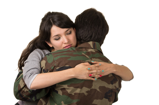 young woman and soldier in military uniform say goodbye deployment - Photo, Image